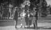 1920c1_unk_men_and_women_in_park_c1920