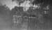 1926q1_man_on_scaffold_in_woods_1926