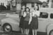 1941c3_Party_GailAnne_Marge_Lorna_laughing_by_car_14Feb1941